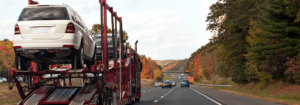 open carrier auto transport on highway