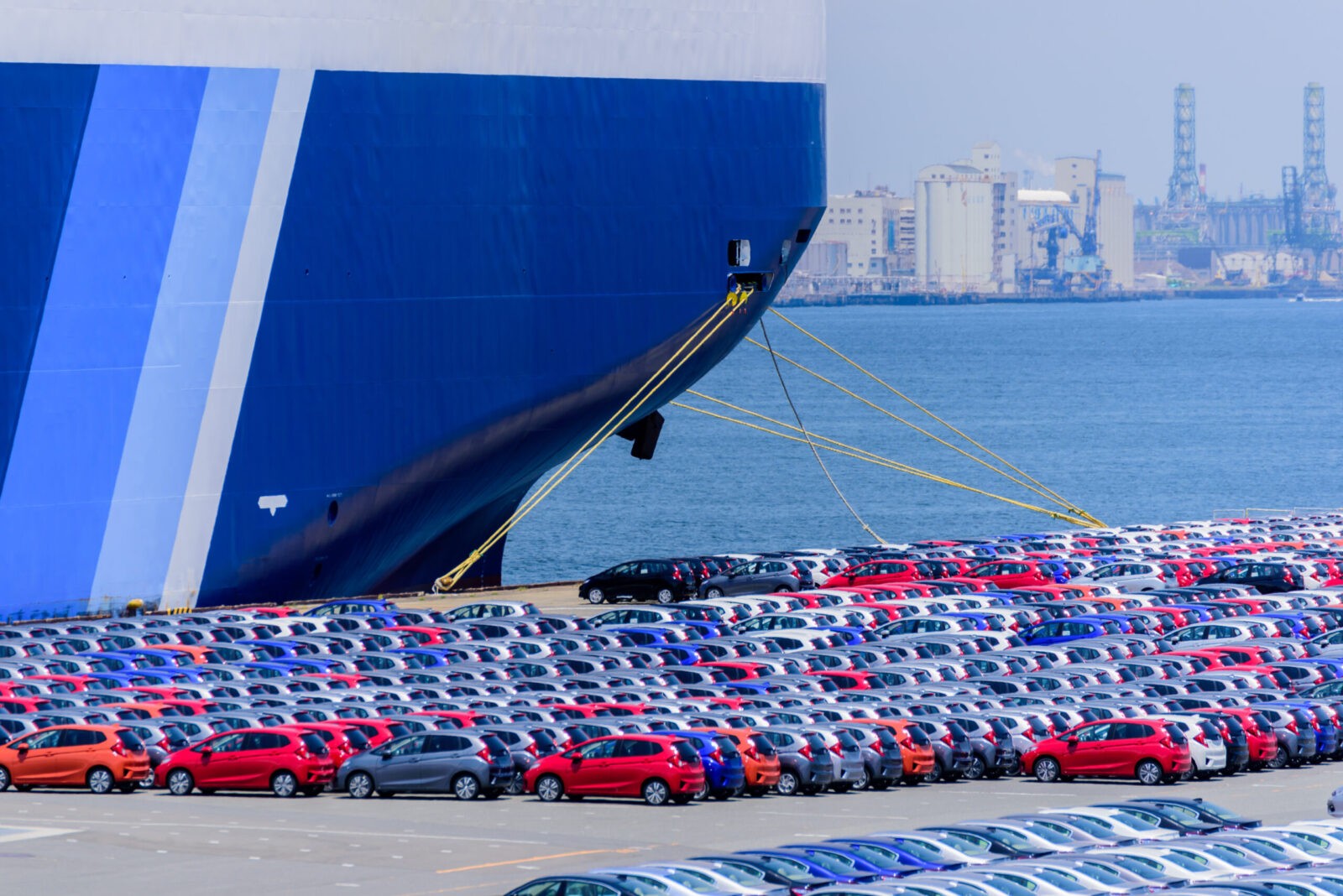 Preparing to load an ocean freighter with vehicles